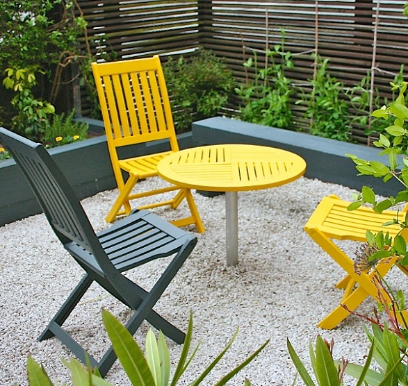 Spruce up your Garden and Patio Furniture - yellow painted table and chairs